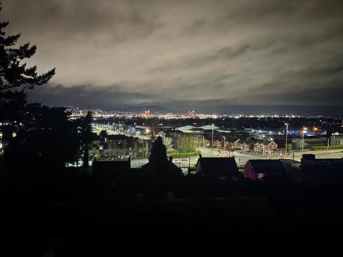 a view of a city at night at Castlereagh Belfast beauty in Belfast