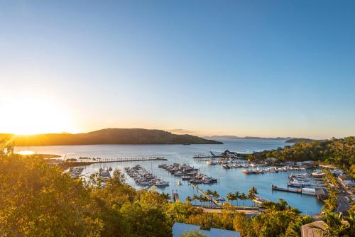 an aerial view of a marina with boats in the water at Haven House at Hamilton Island in Hamilton Island