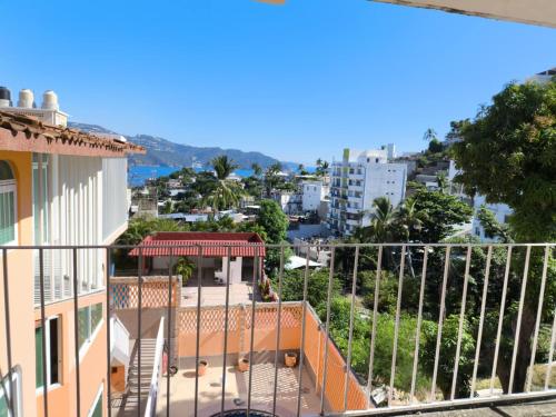 a view from the balcony of a building at HOSTEL Las Colinas in Acapulco