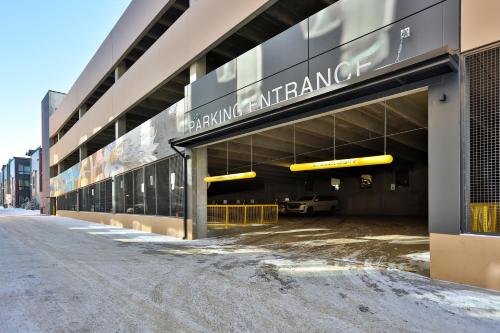 a building with a car parked inside of it at Hotel Indigo - Silverthorne by IHG in Silverthorne