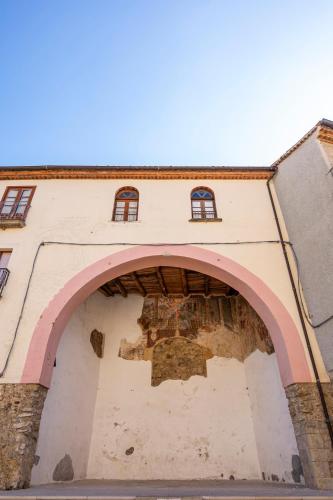 an archway in the side of a building at PIAZZA LAURINO Apartments in Laurino