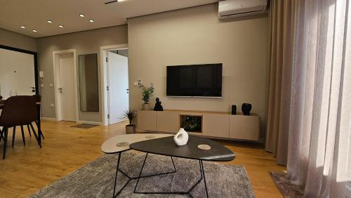 TV a/nebo společenská místnost v ubytování Kris Apartments