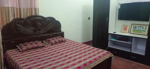 Katil atau katil-katil dalam bilik di Homestay Comfort Villa