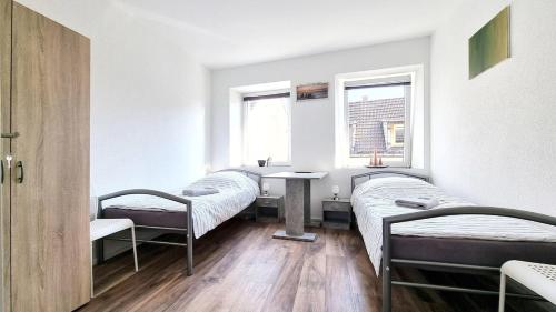 Katil atau katil-katil dalam bilik di StadtRaum mit 3 Zimmer am Rhein