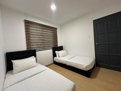 Voodi või voodid majutusasutuse Bayu Senja Lodge toas