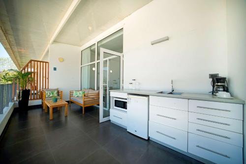 Η κουζίνα ή μικρή κουζίνα στο Tucan Suites Tarapoto - Hotel Asociado Casa Andina