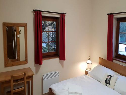 Кровать или кровати в номере Holiday Home in aclé by Family Ski Park