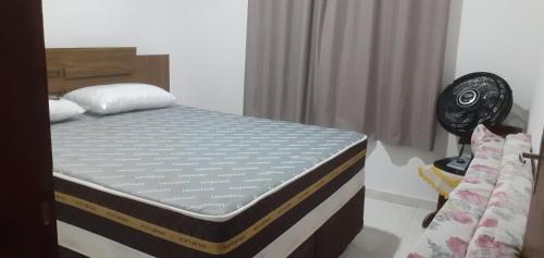 Ένα ή περισσότερα κρεβάτια σε δωμάτιο στο Cantinho de paz