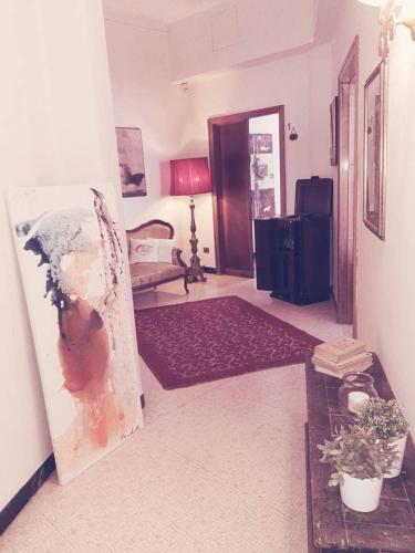 a living room with a couch and a table at Donna Franca in Lecce