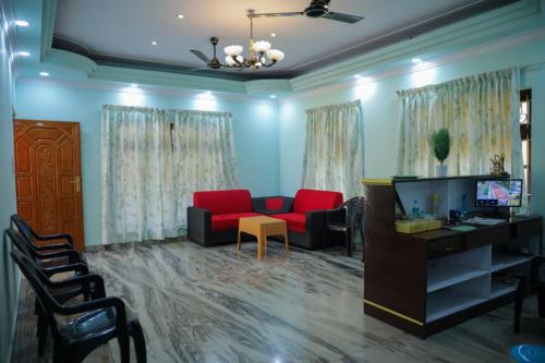 TV a/nebo společenská místnost v ubytování sarangvilla homestay varkala,edava