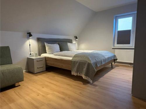Katil atau katil-katil dalam bilik di Buedlfarm-Grosse-Wohnung