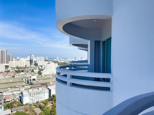a rendering of a building with a city in the background at D Varee Jomtien Beach, Pattaya in Jomtien Beach