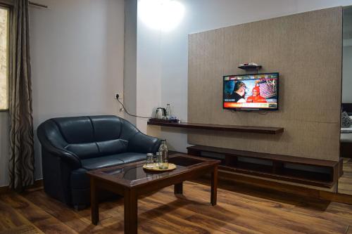 TV a/nebo společenská místnost v ubytování HHW Hotel- Agra