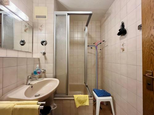 a bathroom with a sink and a shower at Haus Baur, Fewo Dorfstadl 37 oder Heustadl 38 in Oberstdorf