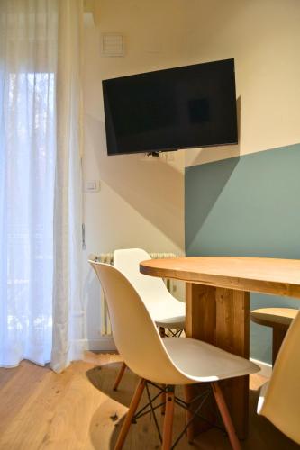 TV a/nebo společenská místnost v ubytování Everyday Apartments Corte Petroni