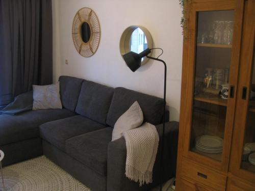 Χώρος καθιστικού στο Zeezicht XVII - Modern apartment with terrace, view on pool T53