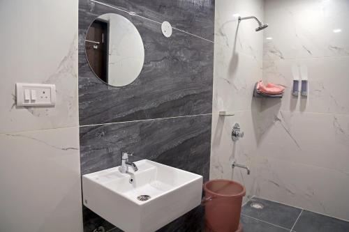 Koupelna v ubytování Amara Bari - 3BHK, Gachibowli, Hyderabad
