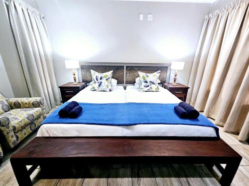 Postel nebo postele na pokoji v ubytování 2 Owls Guesthouse