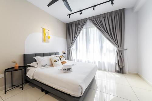 Cama o camas de una habitación en Gaia Residence, Gamuda Gardens Rawang by Sleepy Bear