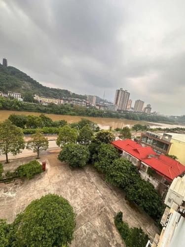 an aerial view of a park with trees and buildings at Khách sạn Vĩnh Lộc in Lao Cai