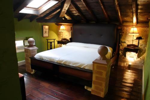 Ένα ή περισσότερα κρεβάτια σε δωμάτιο στο Posada del Indiano