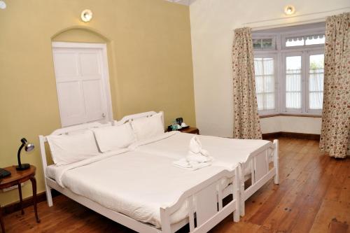 Una cama o camas en una habitación de Wyoming Heritage