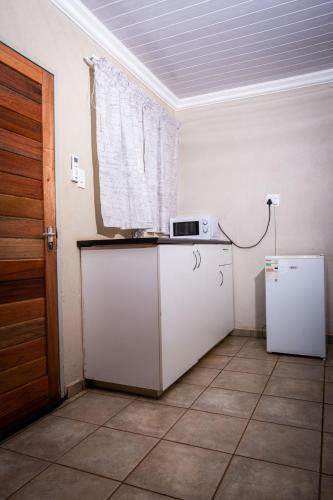 Kuchyň nebo kuchyňský kout v ubytování Lempitse Lodge