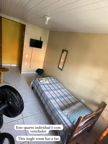 Una cama o camas en una habitación de RioSlz Hostel