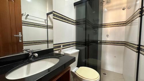 Koupelna v ubytování Thermas Paradise Apartamentos Rio Quente Esplanada