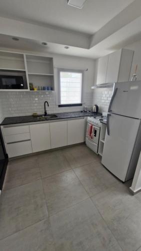 Kuchyň nebo kuchyňský kout v ubytování Casa Poucel