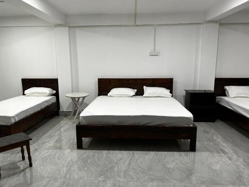Ένα ή περισσότερα κρεβάτια σε δωμάτιο στο Tsewangs Bed & Breakfast Homestay