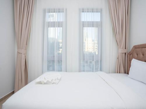 Postel nebo postele na pokoji v ubytování Holidays R Us villa 3 bedroom premium location