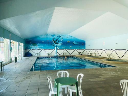 Bazén v ubytování Apto Eco Resort Capivari - CTBA nebo v jeho okolí