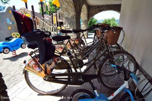 a couple of bikes parked next to a wall at Mileżówka - Noclegi&SPA in Ustroń