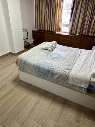 Ένα ή περισσότερα κρεβάτια σε δωμάτιο στο Malaguetor Home