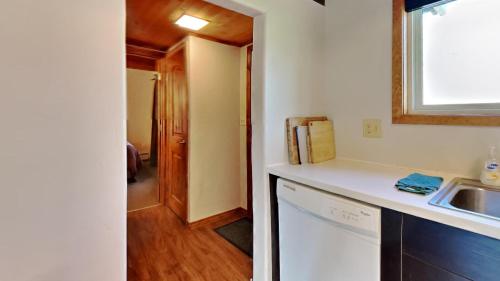 a kitchen with a sink and a counter top at Palmers Dr 1010 in Silverthorne