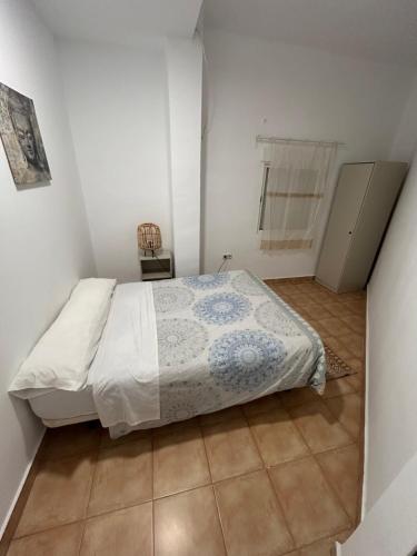 Ένα ή περισσότερα κρεβάτια σε δωμάτιο στο Malaguetor Home