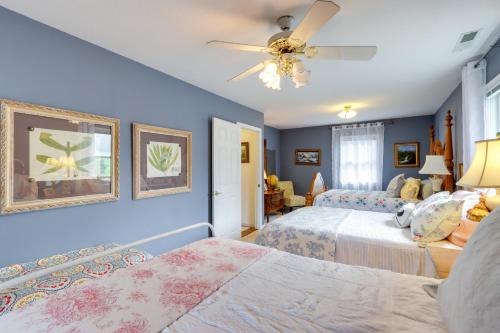 a bedroom with two beds and a ceiling fan at 30 Acres of Mountainside Peace Home in Marble in Marble
