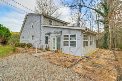 a small white house with a garage at 30 Acres of Mountainside Peace Home in Marble in Marble