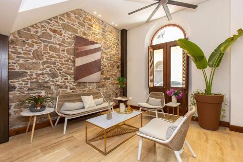 Posezení v ubytování Villas La Fontana Amplias ApartaSuite-piscina 201