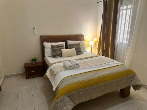 Postel nebo postele na pokoji v ubytování Apartment deux chambre équipé