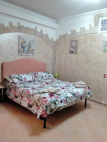 Postel nebo postele na pokoji v ubytování Casa Flasia