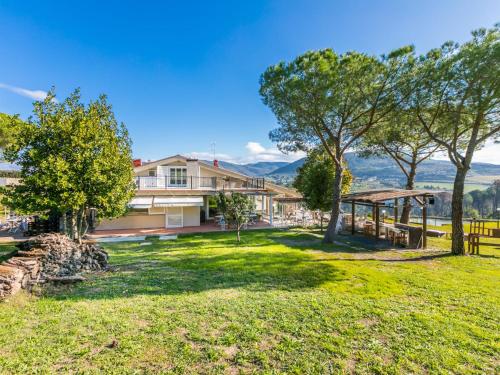 a yard with a picnic table and a gazebo at Holiday Home Casa di Palaia by Interhome in Greve in Chianti