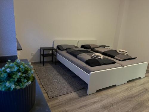 a bedroom with two beds in a room at areahome in Oberhausen