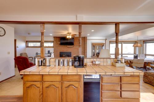 a kitchen and living room with a counter top at Mtn-View Retreat Near Hiking in Bayfield! in Bayfield