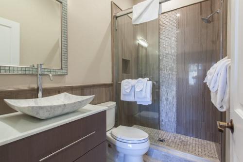 a bathroom with a sink and a toilet and a shower at Snowcreek #754 - Phase V in Mammoth Lakes