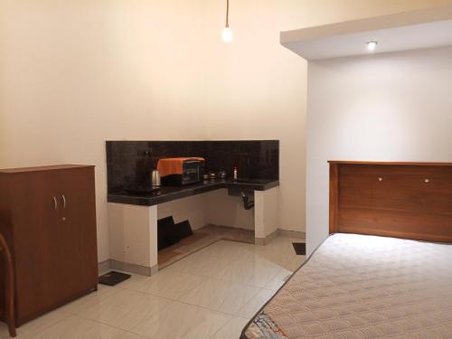 a room with a counter with a sink in it at The Pearl Villa Ahangama in Ahangama