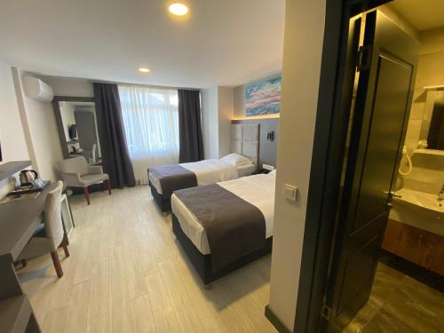 Sahil Hotel Pendikにあるベッド