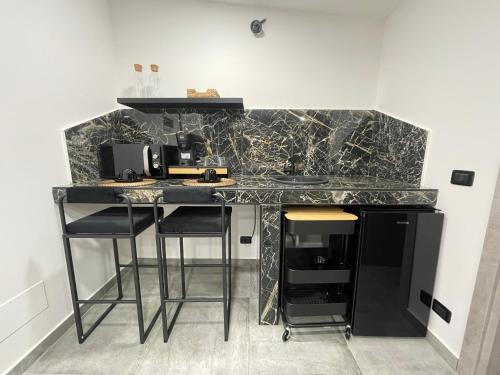 Kuchyň nebo kuchyňský kout v ubytování Affitta camere Vittoria House