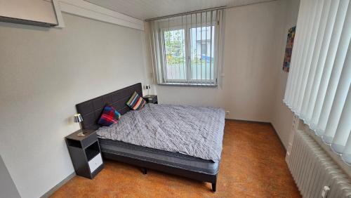 Ένα ή περισσότερα κρεβάτια σε δωμάτιο στο Business Appartement Ingelheim